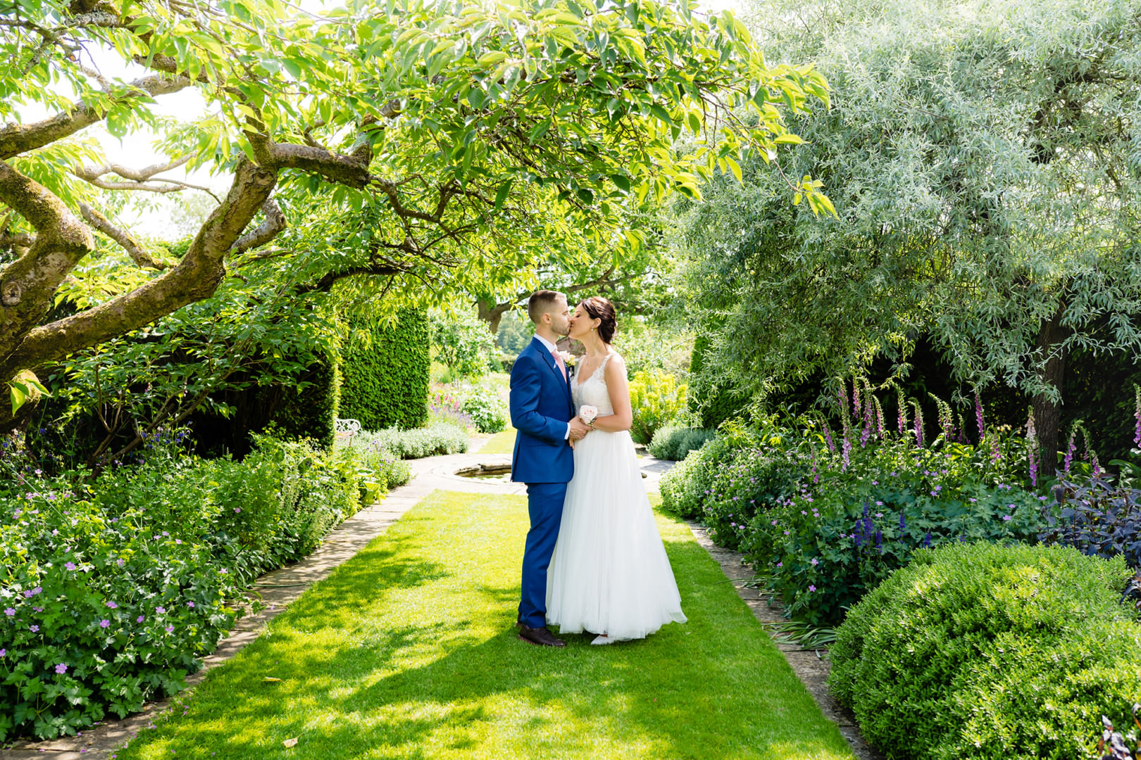 BRIDE AND GROOM AT MICKEFIELD HALL WEDDING VENUE IN HERTFORDSHIRE 