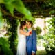 Bride and groom kiss in the gardens of the Old Palace Hatfield House wedding venue in Hertfordshire