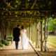 Bride and Groom walking at the Old Palace Hatfield House wedding venue in Hertfordshire