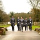 Groomsmen walking at Tewinbury wedding venue in Hertfordshire