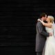couple kiss at Tewinbury wedding venue in Hertfordshire