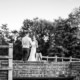 Bride and Groom laughing at Tewinbury wedding venue in Hertfordshire