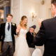 bride and groom entering room at Dyrham Park Country Club Barnet