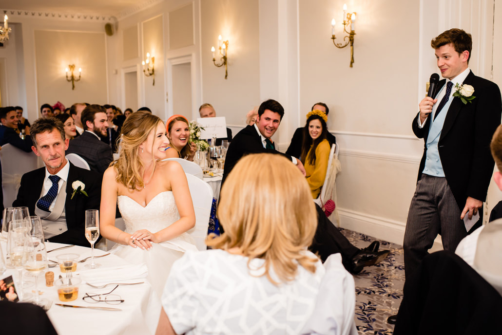 bride and groom wedding speeches at Dyrham Park wedding photography Barnet