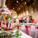 Alice in wonderland themed wedding cake at Hatfield House wedding in Hertfordshire
