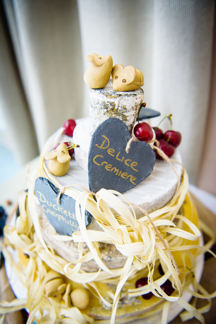 A CAKE OF CHEESE WEDDING CAKE AT MILL GREEN GOLF CLUB IN HERTFORDSHIRE