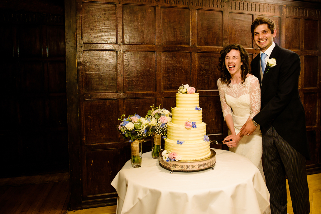 WEDDING CAKE CUT AT GREAT FOSTERS WEDDDING IN SURREY 