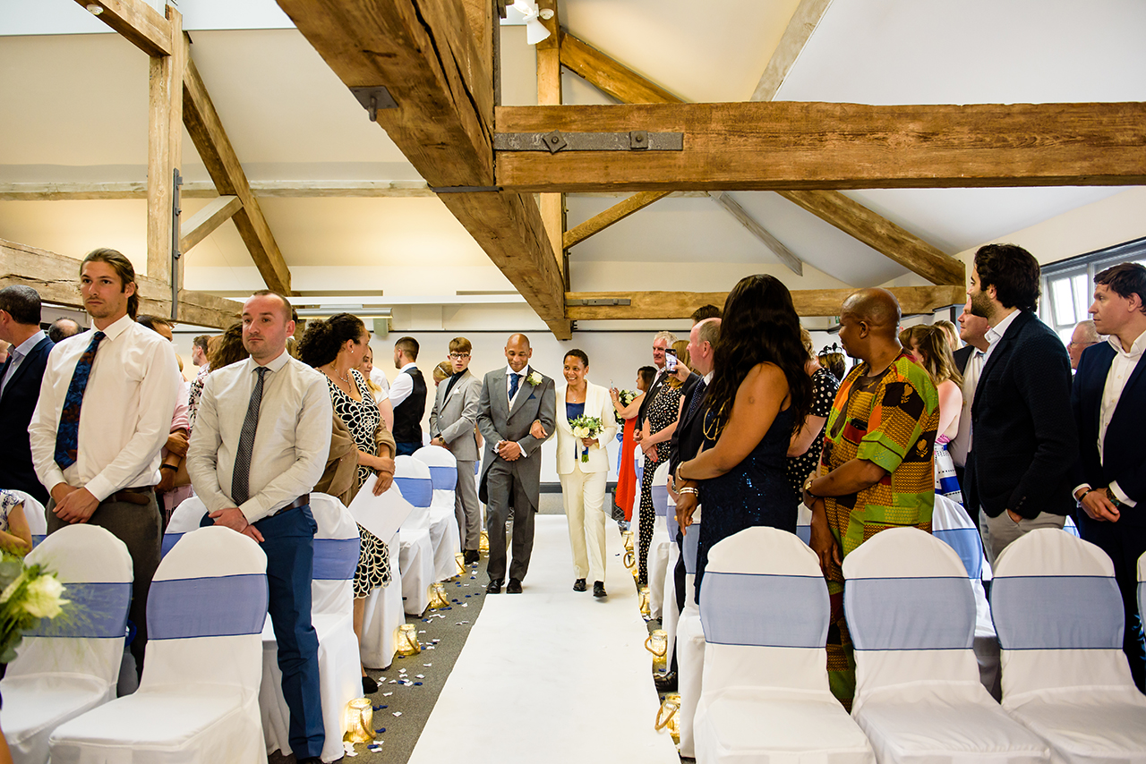 bride walks down the aisle at same sex wedding in Hertfordshire