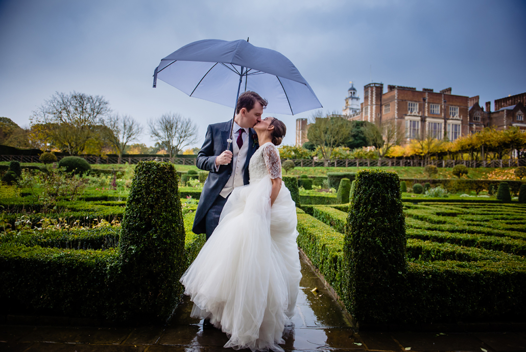 rainy wedding day at Hatfield House in hERTFORDSHIRE