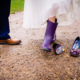 Bride in her welly boots for a rainy wedding day in hertfordshire