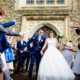 bride and groom confetti throw at St Elthandreds church in hatfield, Hertfordshire