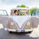 bride and groom kiss in wedding car at chesfield downs wedding venue in hertfordshire