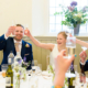 Wedding toast at Hastoe village Hall in Hertfordshire