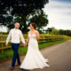 Bride and Groom walking at Milling Barn wedding venue in Hertfordshire