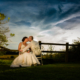 Bride and Groom seated at Milling Barn wedding venue in Hertfordshire